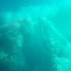 Below the blue ice