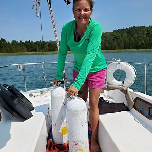 Aug DAM CHUM - Siren Gearing Up To Dive Oyster Bay