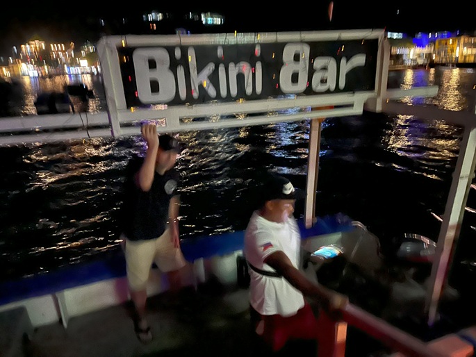 13 - Customers on water taxi to  Bikini Bar