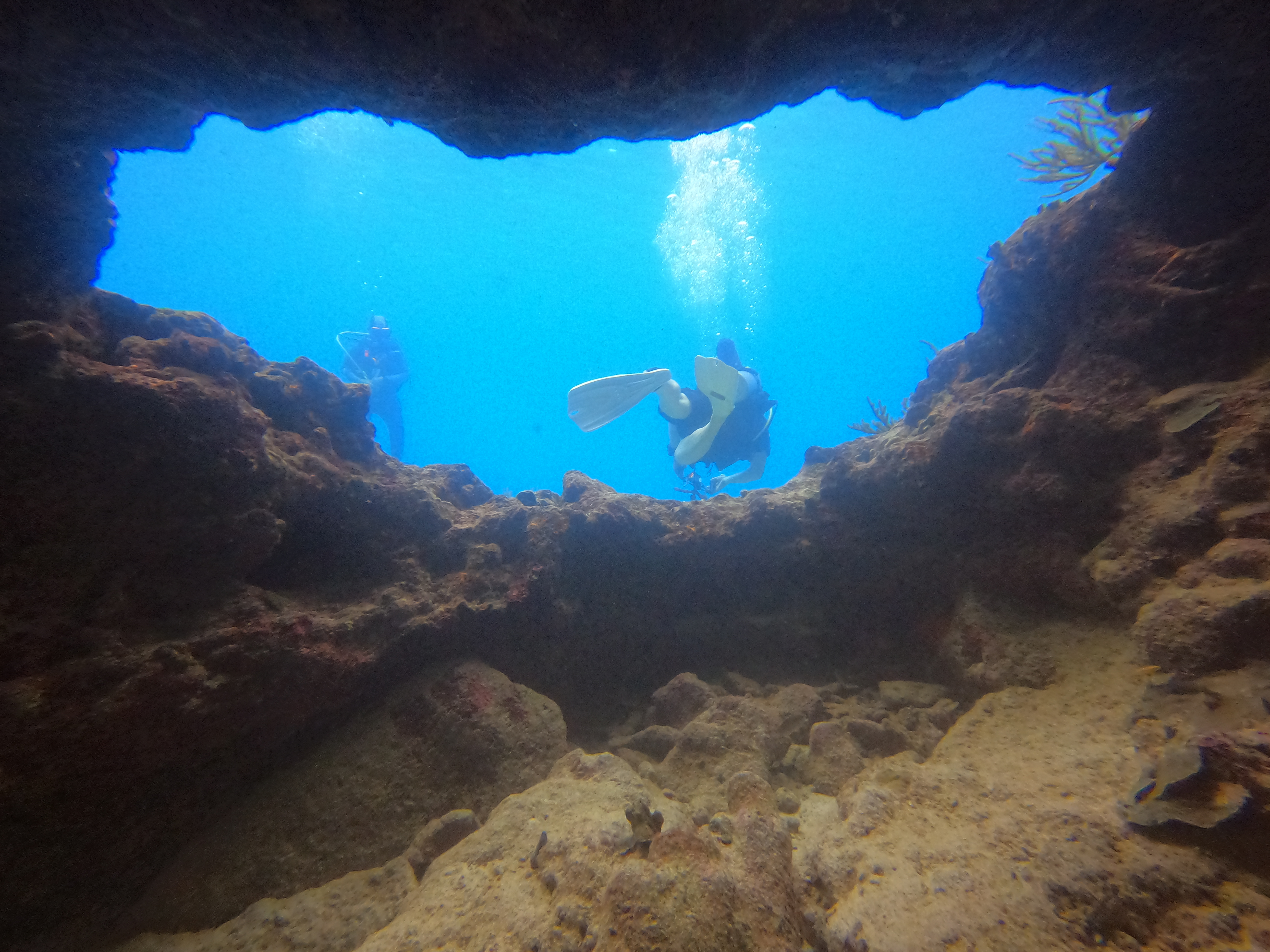 14 - Exiting cavern on Lagun divesite.JPG