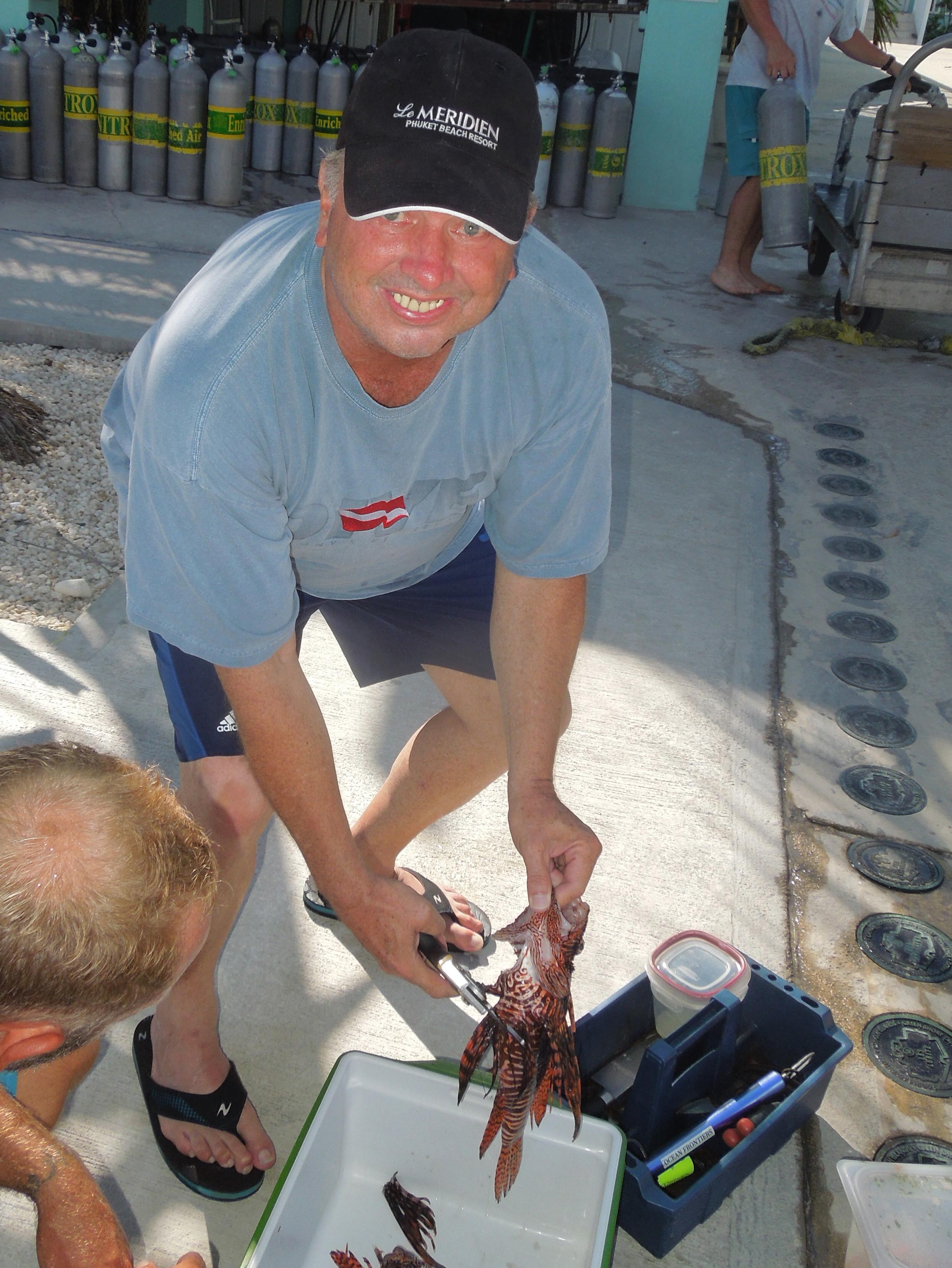 Alan cleaning some lionfish