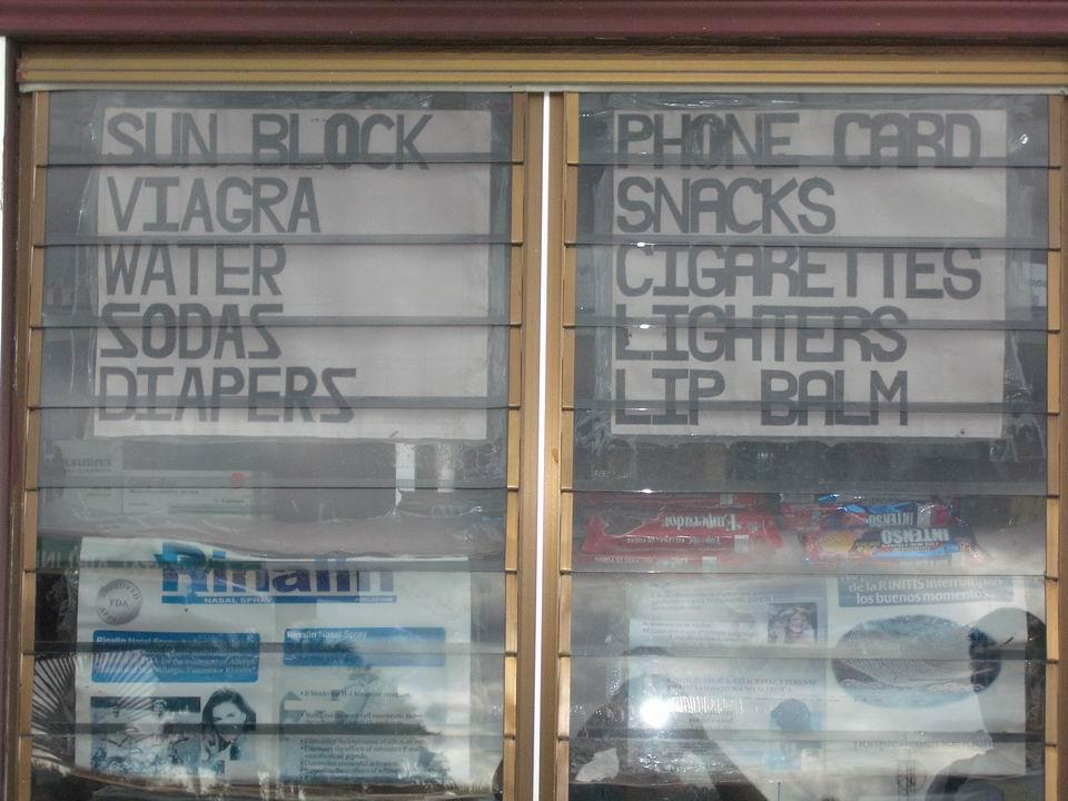 At the newspaper shop...