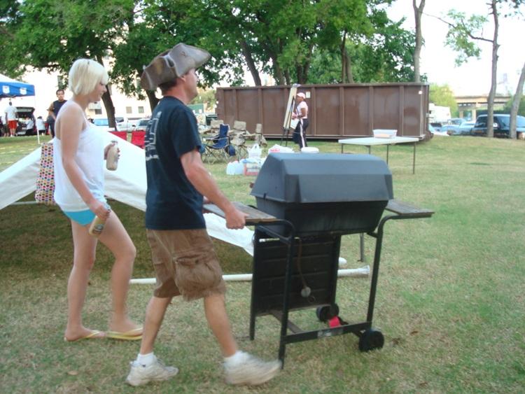 Rockfish and his daughter haul the grill