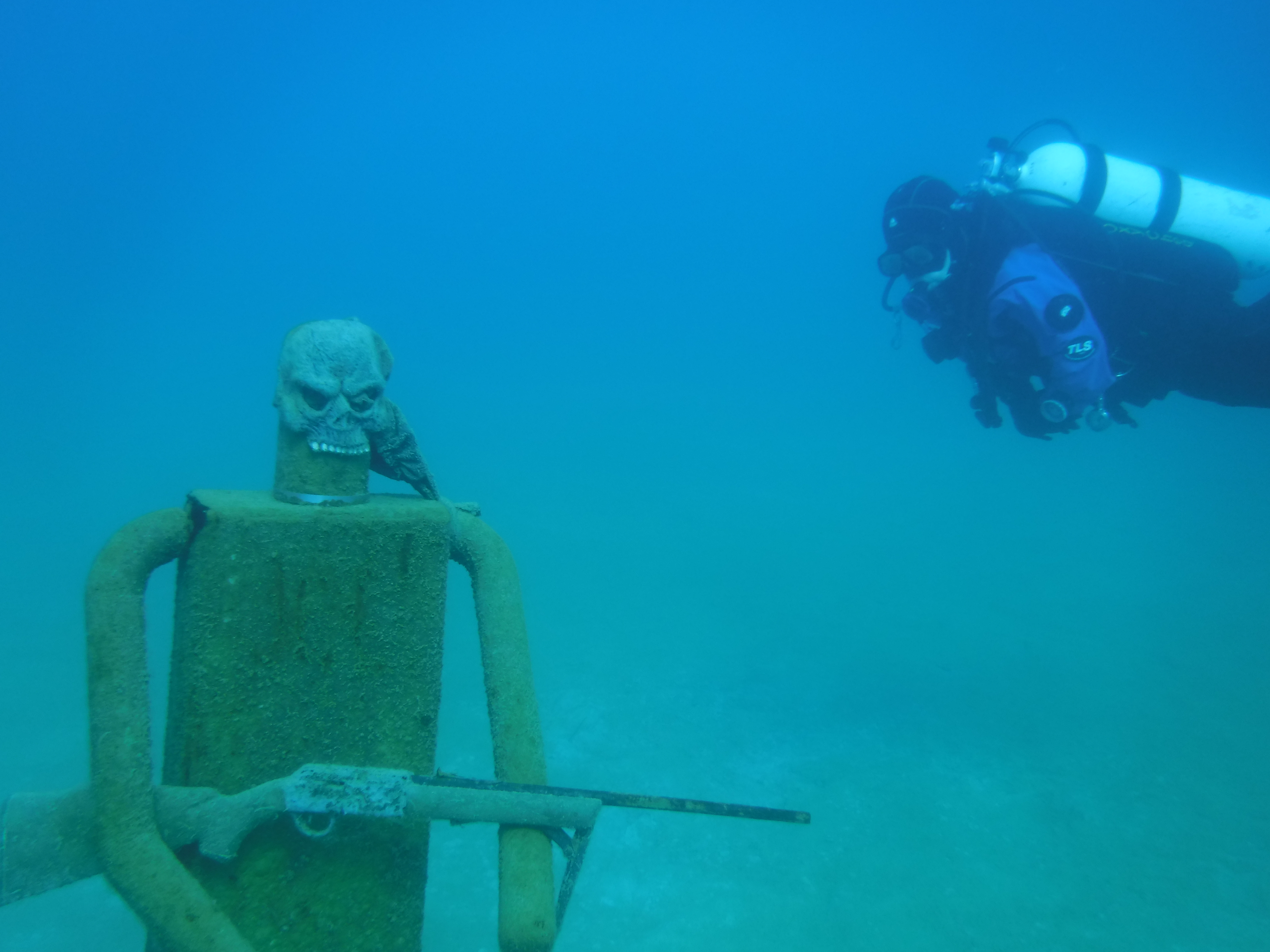 Siren Checks Out Armoured Man - JAN Blue Lagoon